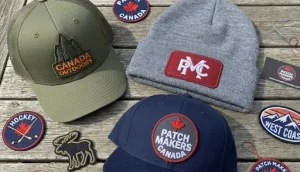3D puff patches and headwear kept on a wooden table