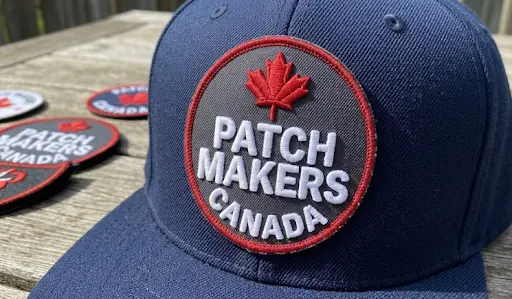 Close-up of a 3D puff patch cap kept on a wooden table